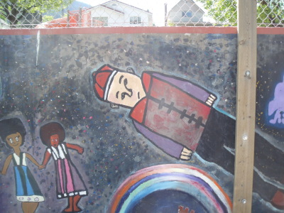 Mural is now over 10 years old. Figures do not have to all be standing at attention.Angles are dramatic.